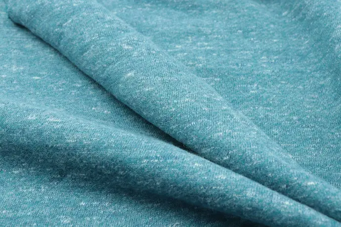 blue textile in close up photography